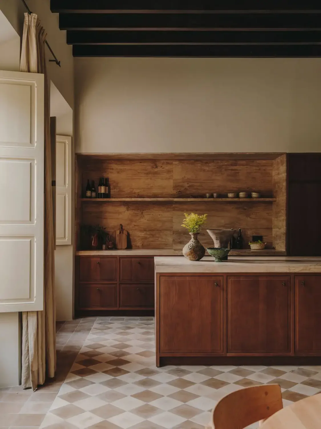 A Historic Townhouse on Majorca with a Striped Pool 3 wooden-kitchen-with-island-checkerboard-floor-nordroom