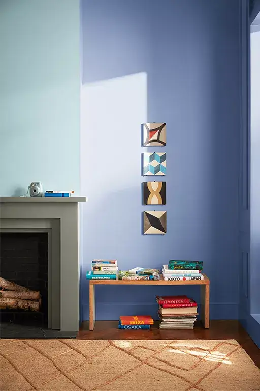 Benjamin Moore Color of the Year 2024: Blue Nova 16 Living-Room-Pale-Blue-Paint-Fireplace-blue-nova-nordroom
