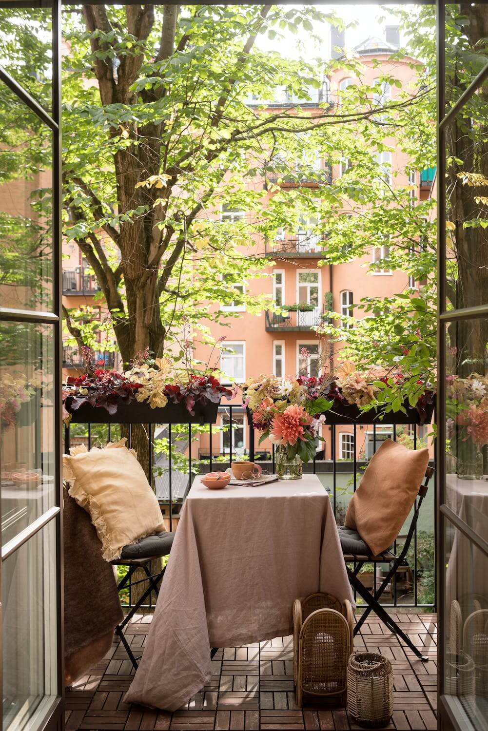 A Charming Open Plan Swedish Apartment 3 balcony-small-table-nordroom