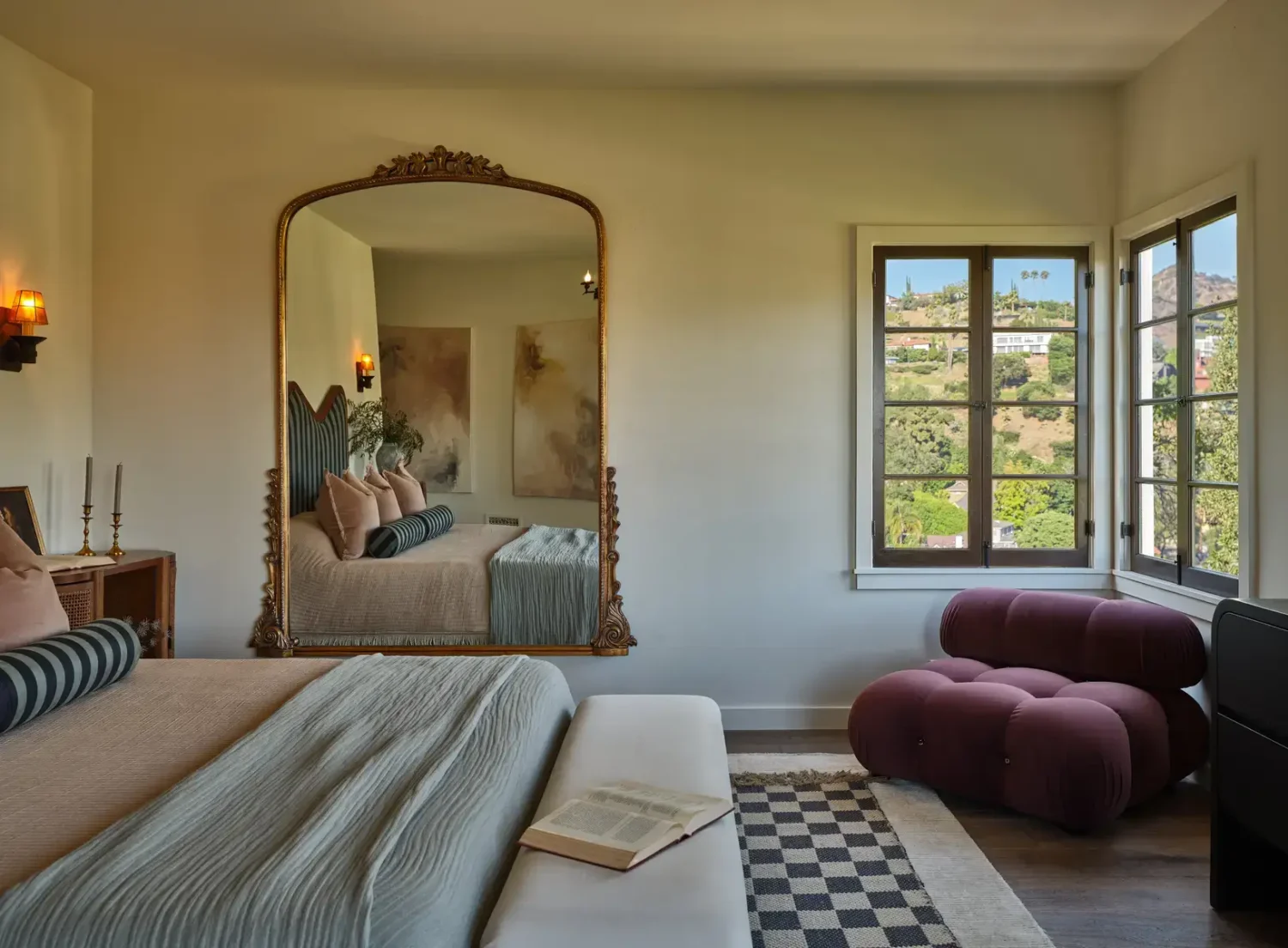 A Renovated Spanish Style Home in Hollywood Hills 24 bedroom-checkerboard-rug-large-mirror-nordroom