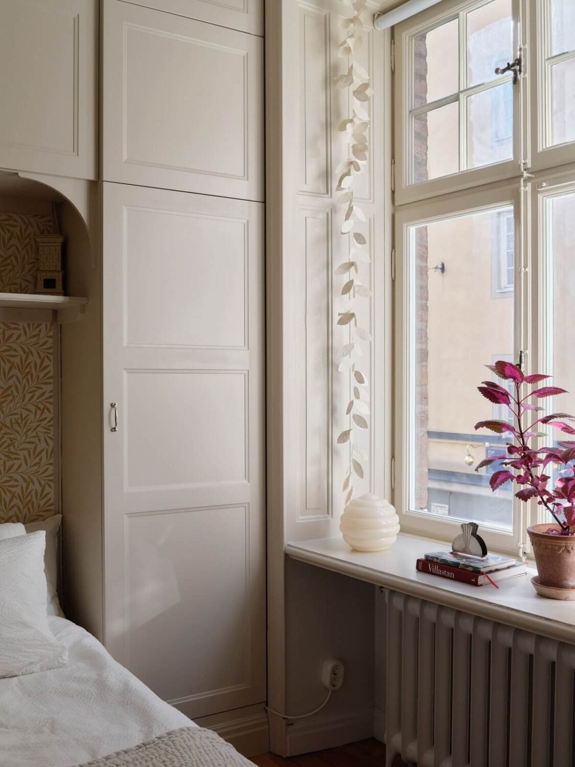 A Light Scandinavian Apartment with Classic Touches 13 bedroom-detail-built-in-wardrobes