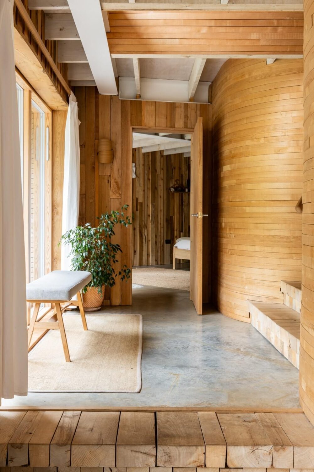 An English Country House That Pairs History with Contemporary Design 12 bended-wood-hallway-modern-extension-nordroom