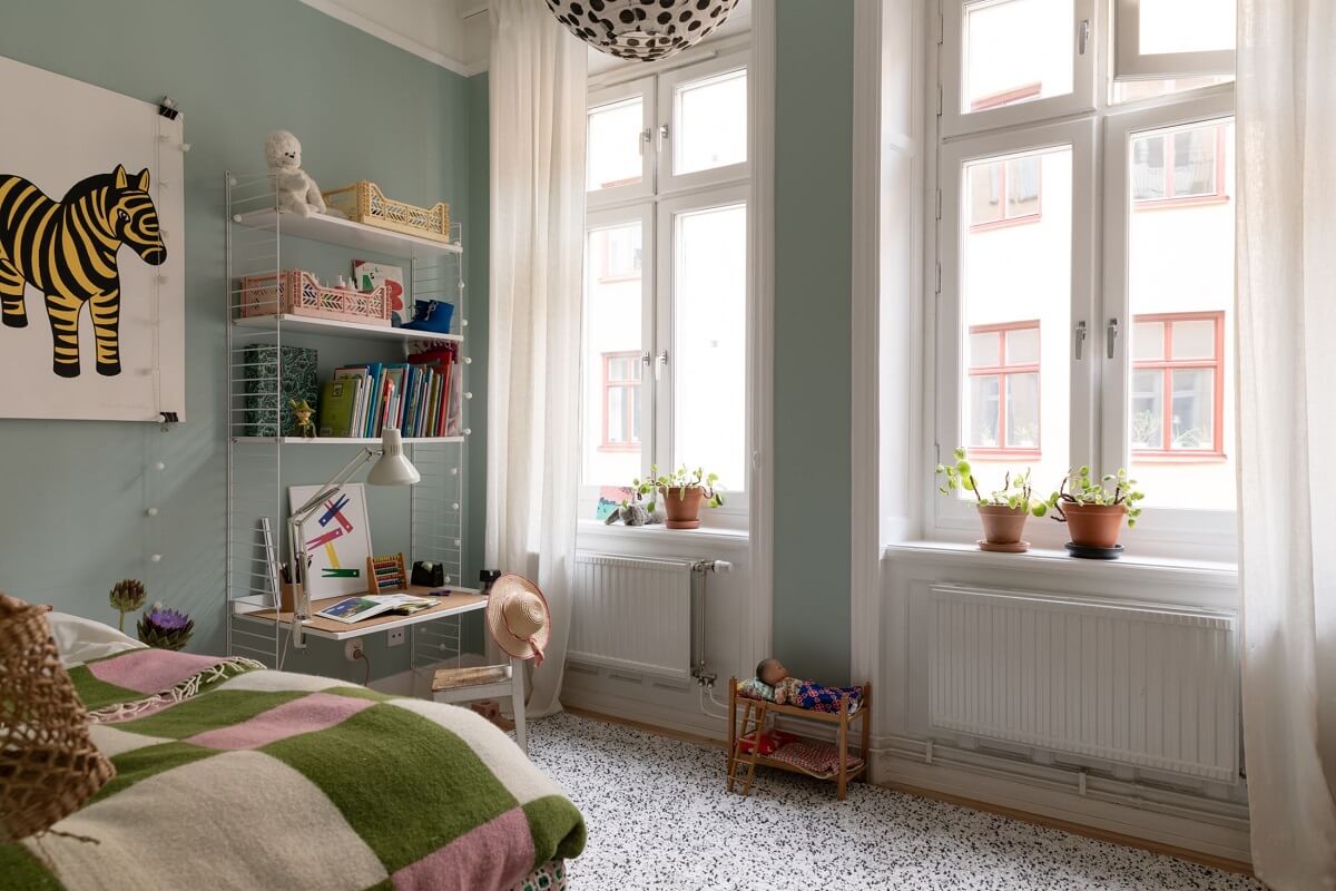 A Bright Scandinavian Apartment with a Light Gray Kitchen 17 childrens-bedroom-light-blue-walls-string-shelves-desk-nordroom