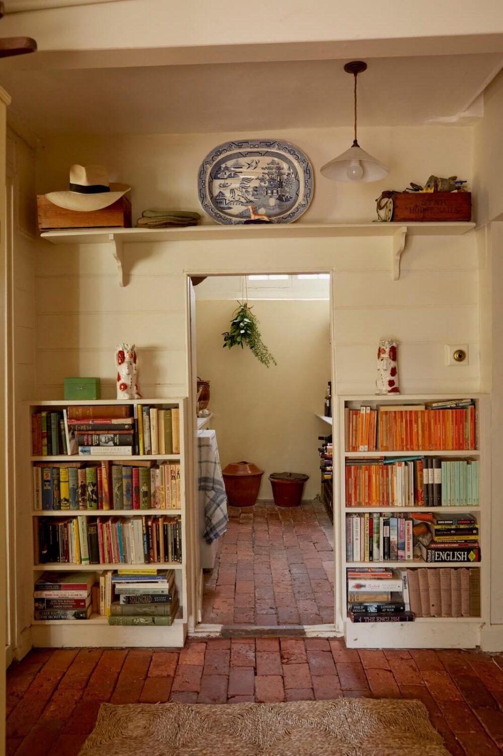 A Charming Historic Farmhouse with a Bright Yellow Kitchen 10 english cottage stone floor