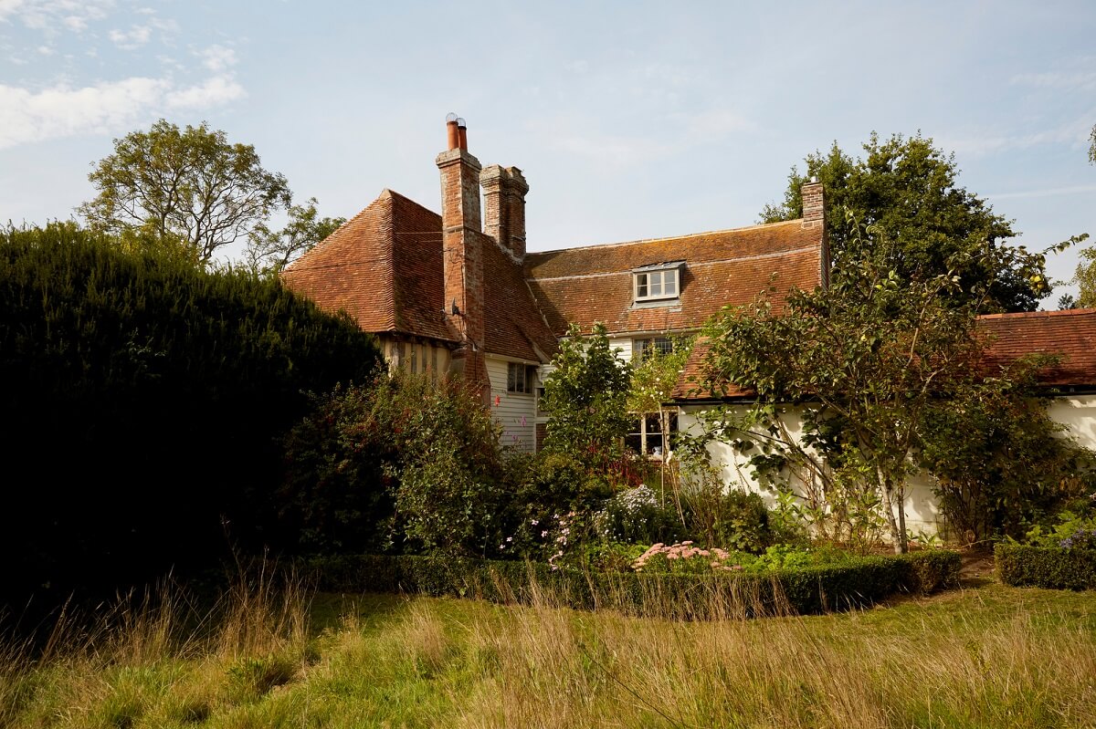 A Charming Historic Farmhouse with a Bright Yellow Kitchen 23 english country house
