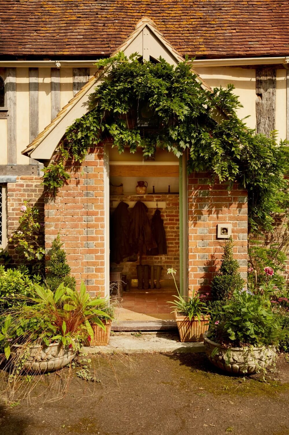 A Charming Historic Farmhouse with a Bright Yellow Kitchen 28 entry hall english country house