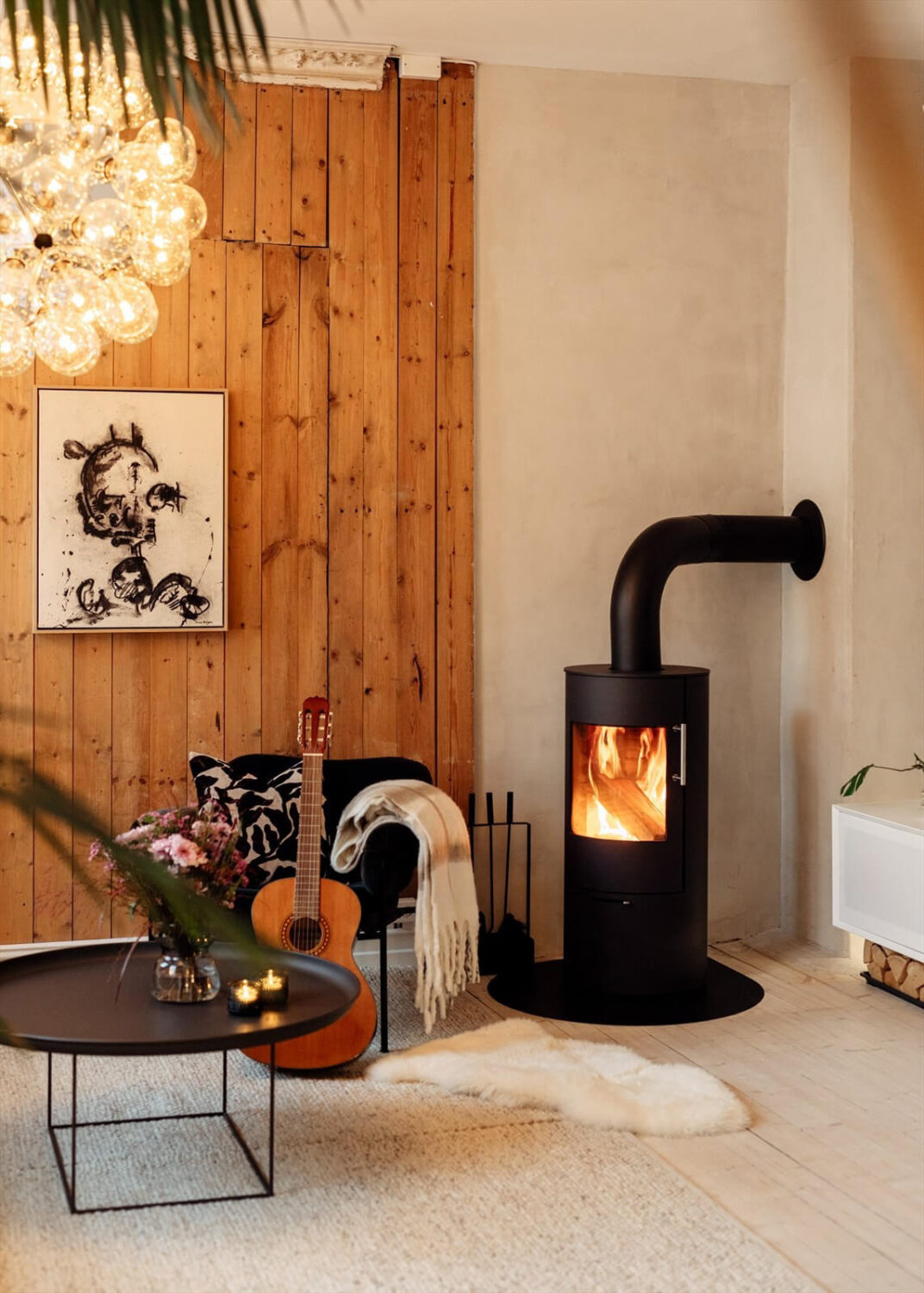 A Charming Norwegian Apartment with Wooden Walls 3 exposed-wooden-wall-wood-burner-nordroom