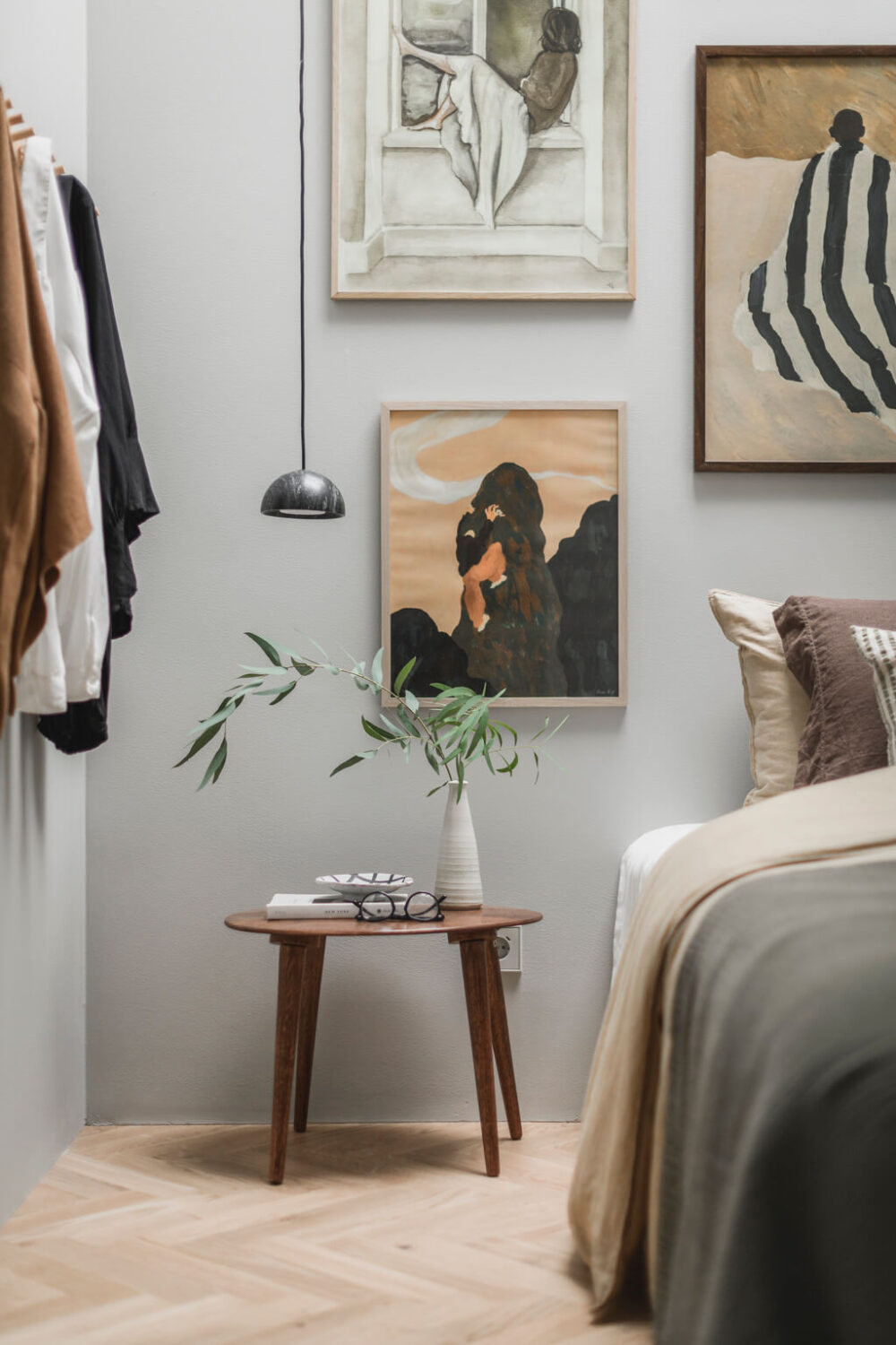 A Stylish Modern Gray Attic Apartment 19 gallery-wall-side-table-bedroom-nordroom
