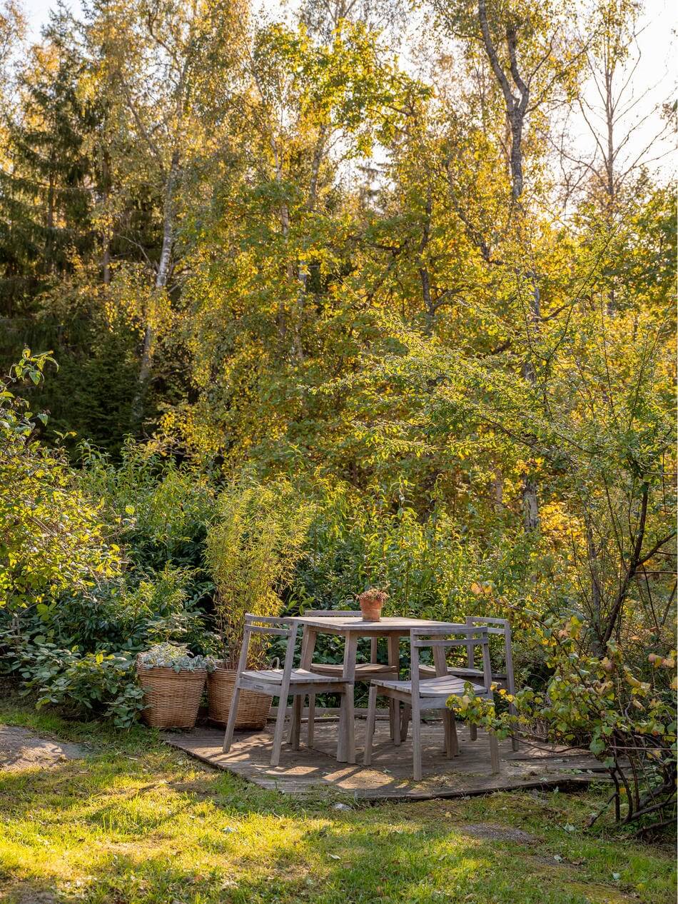 An Architectural Wooden Home with Open Spaces 25 garden-dining-space