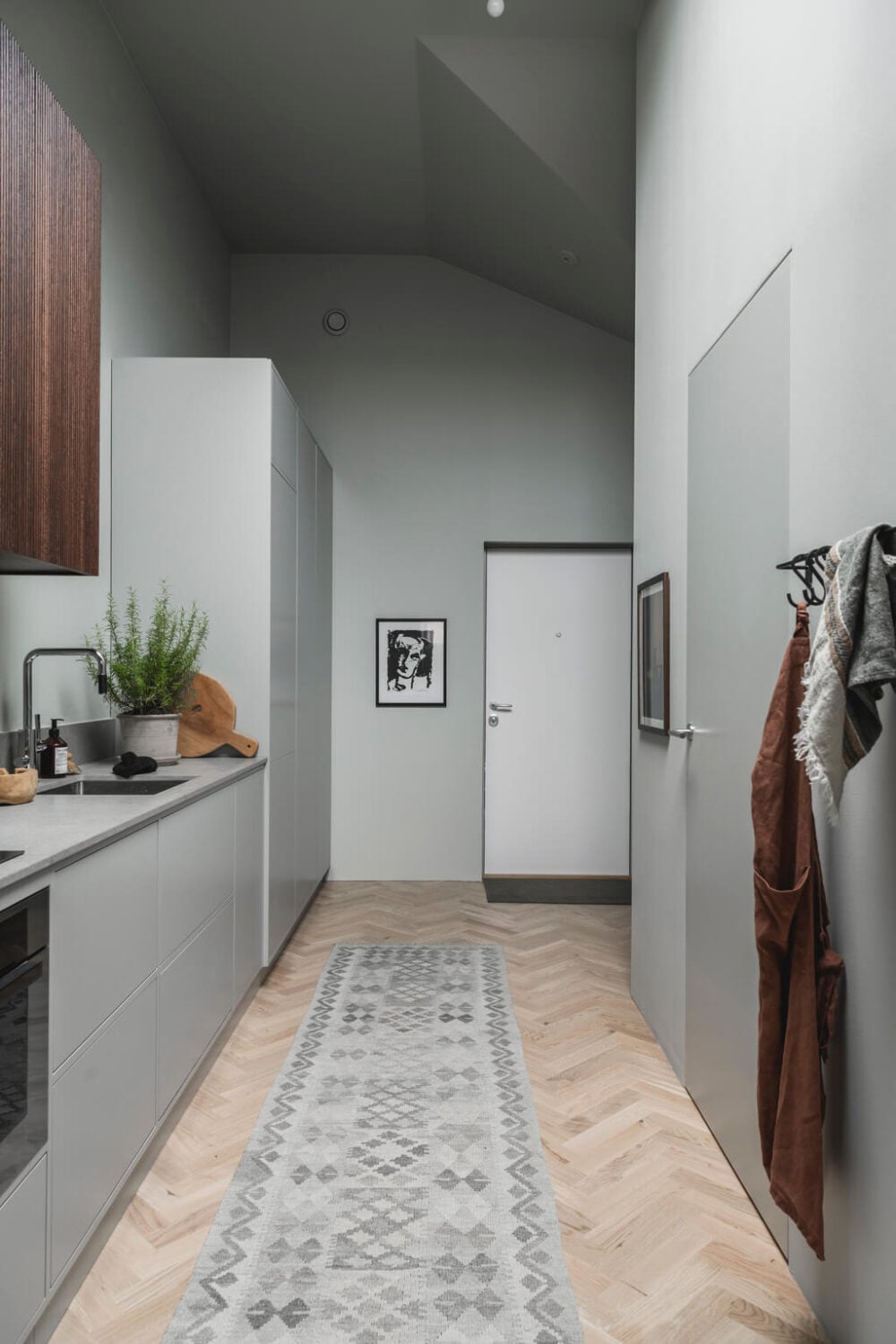 A Stylish Modern Gray Attic Apartment 12 gray-modern-kitchen-scandinavian-design-nordroom