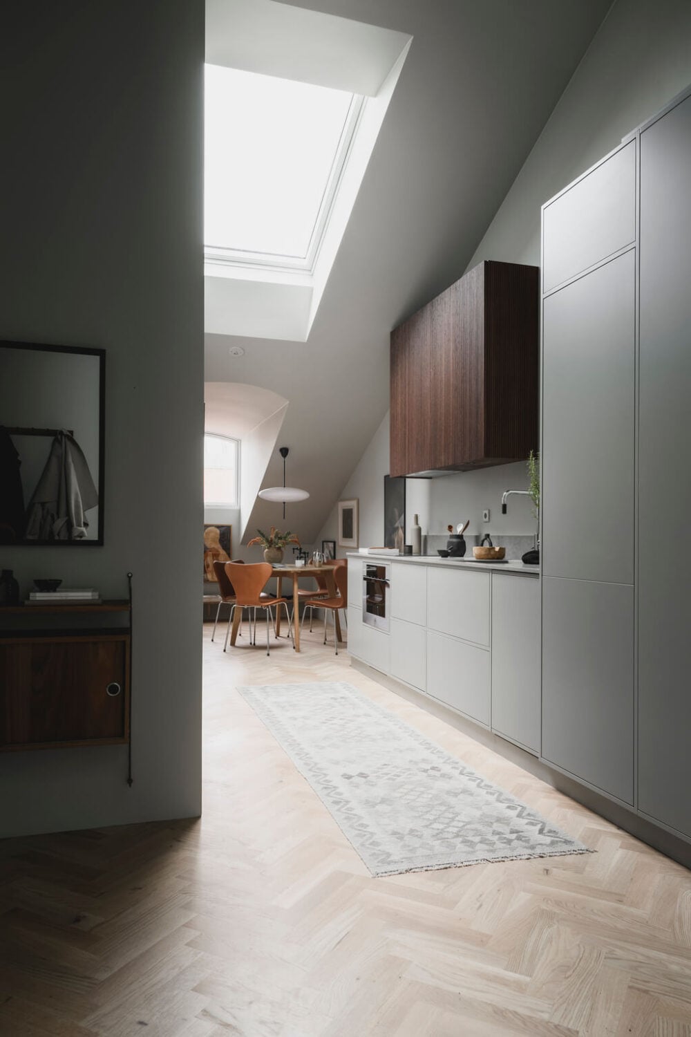 A Stylish Modern Gray Attic Apartment 13 gray-wood-scandinavian-kitchen-wooden-floor-nordoom