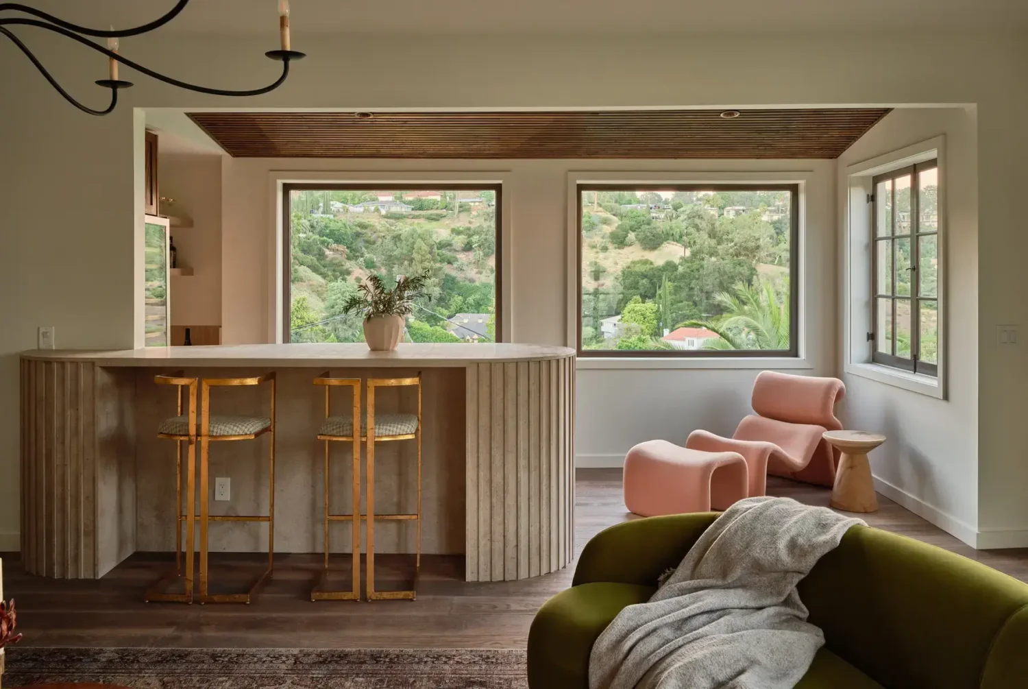 A Renovated Spanish Style Home in Hollywood Hills 9 green-sofa-home-bar