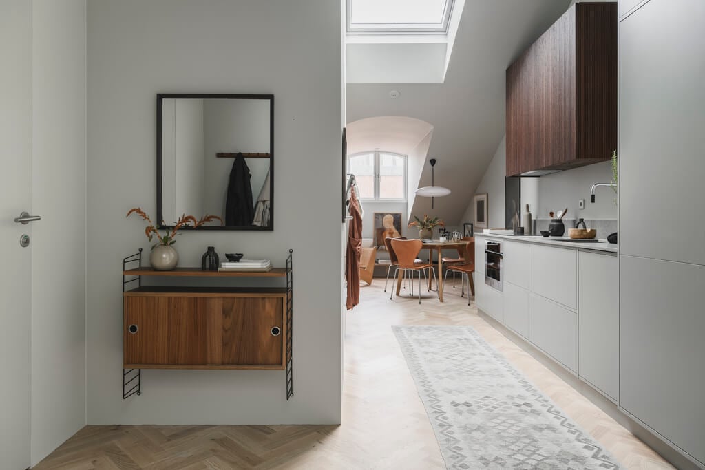 A Stylish Modern Gray Attic Apartment 14 hallway-floating-cabinet-kitchen-nordroom