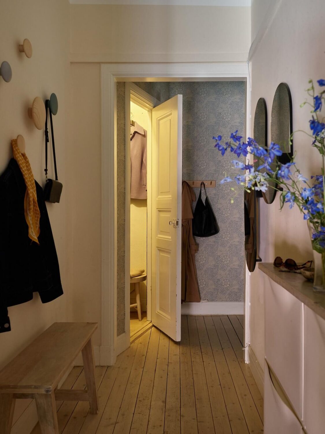Pastel Colors in a Light Scandinavian Apartment 18 hallway-shoe-storage-bench-hooks-nordroom