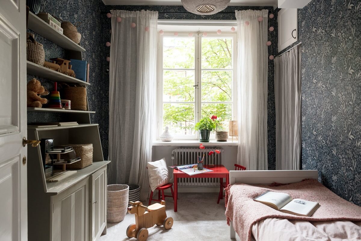 A Charming Open Plan Swedish Apartment 14 kids-bedroom-blue-wallpaper-nordroom