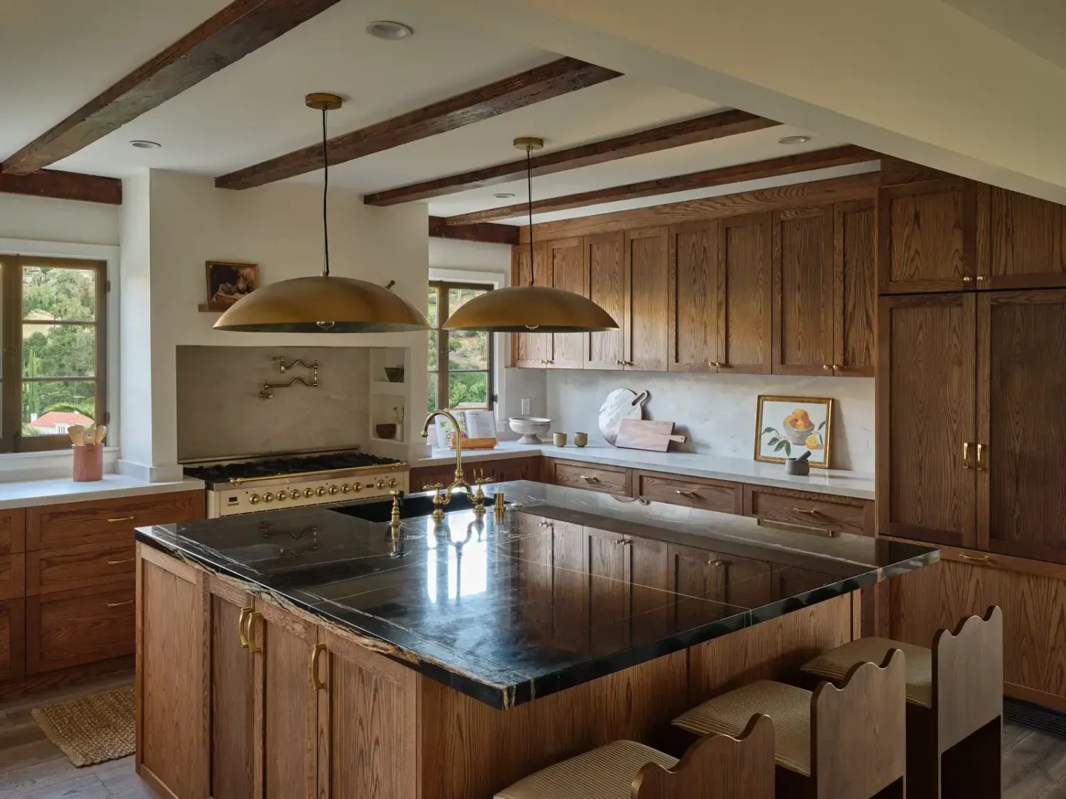 A Renovated Spanish Style Home in Hollywood Hills 13 kitchen-oak-cabinets-sahara-noir-marble-worktop-nordroom