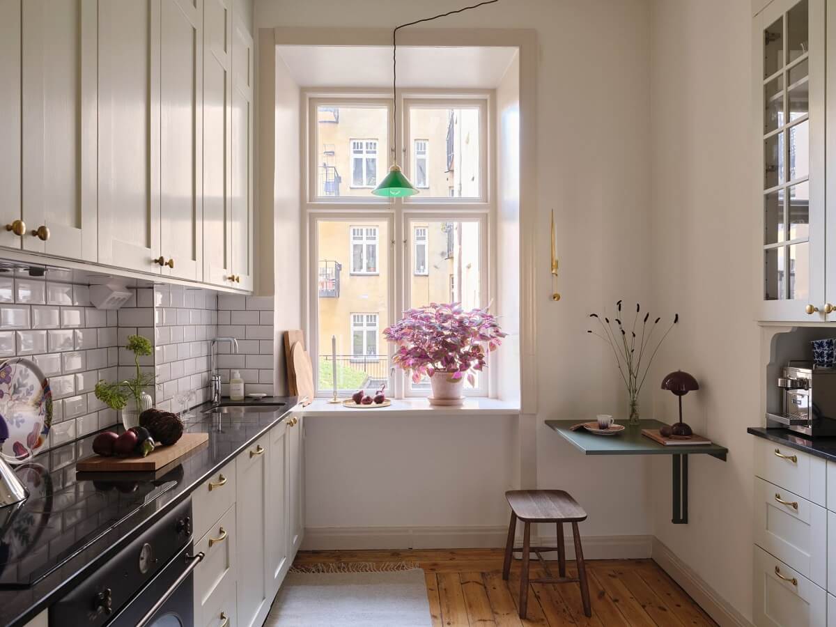 A Light Scandinavian Apartment with Classic Touches 18 kitchen-with-small-floating-table-nordroom
