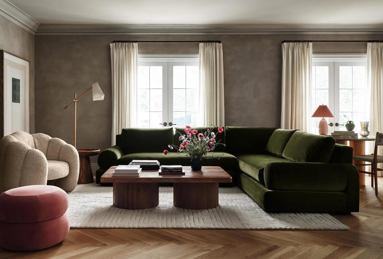 Interior Design Trends for 2024: Comfort, Nature, and Warmth 57 large green sofa wam textiles coffee table round legs nordroom