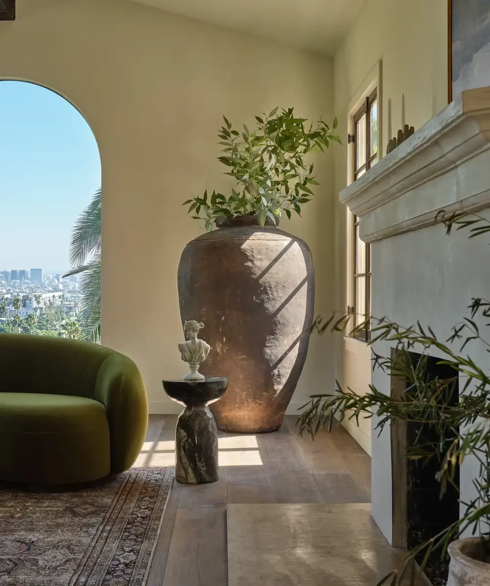 A Renovated Spanish Style Home in Hollywood Hills 2 large-plant-pot-living-room