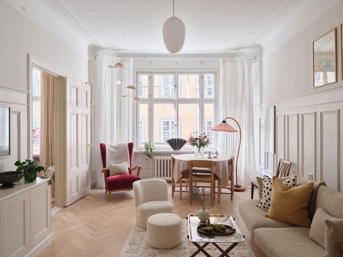 A Light Scandinavian Apartment with Classic Touches 2 light-living-room-wall-paneling-nordroom