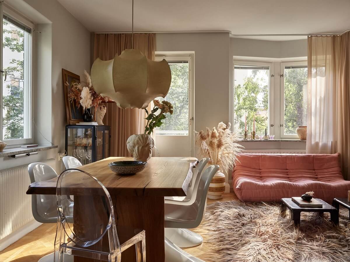 Warm Pink Tones in A Stockholm Apartment 5 living-and-dining-room-pink-sofa-nordroom