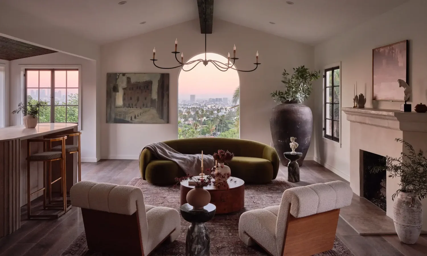 A Renovated Spanish Style Home in Hollywood Hills 7 living-room-arched-window-green-sofa-nordroom