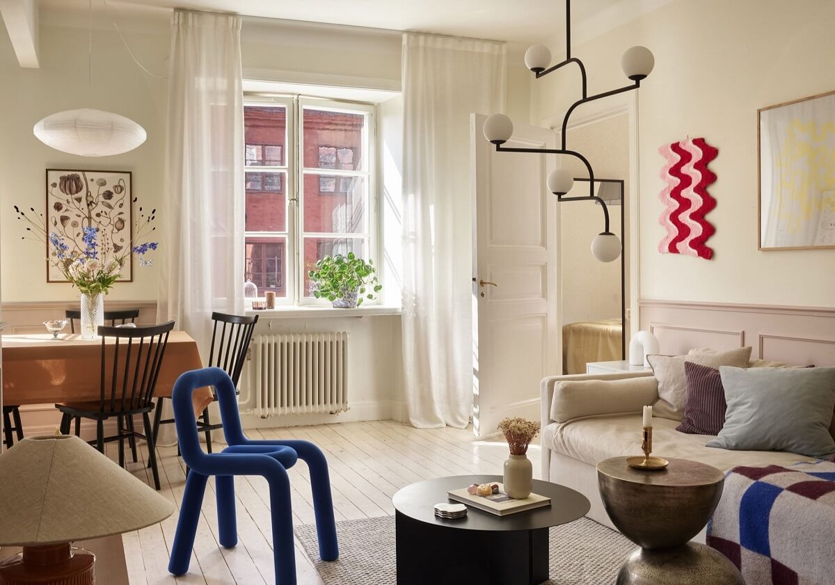 Pastel Colors in a Light Scandinavian Apartment 3 living-room-blue-pink-color-accents-nordroom