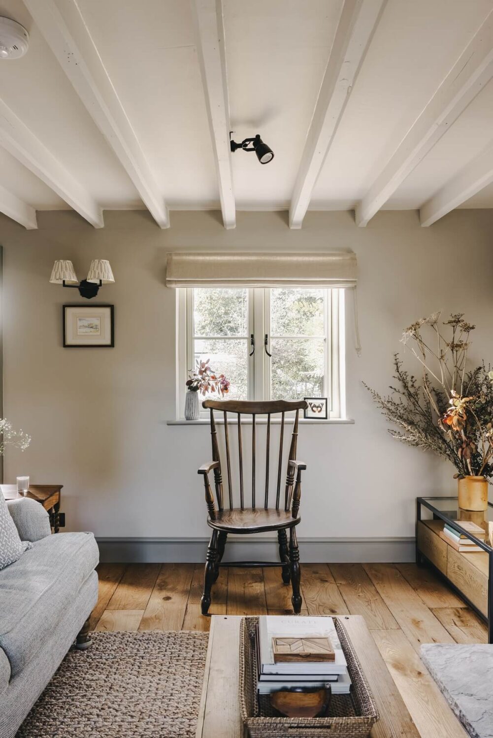 The Workers Cottage: An English Holiday Home with a Royal Past 2 living-room-ceiling-beams-wooden-floor-cottage