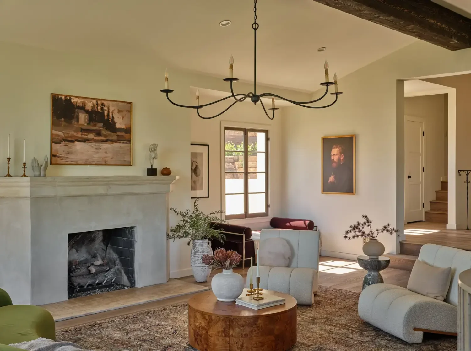 A Renovated Spanish Style Home in Hollywood Hills 3 living-room-fireplace-wooden-beam-nordroom
