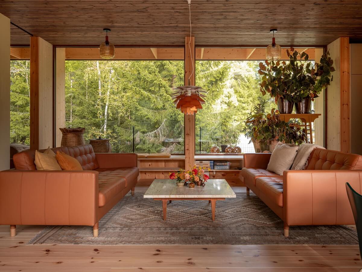 10 Sofa Trends for 2026: The Year the Couch Became the Main Character 12 living-room-leather-sofas-large-floor-to-ceiling-windows-nordroom