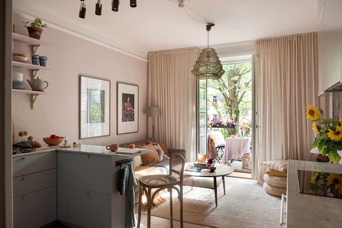 A Charming Open Plan Swedish Apartment 1 living-room-pink-color-accents-nordroom