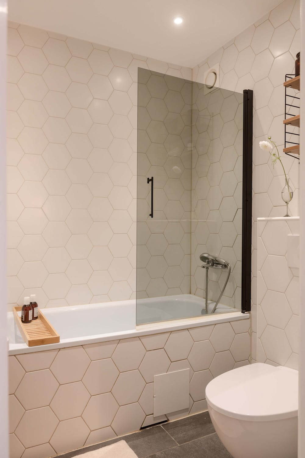 A Charming Open Plan Swedish Apartment 16 modern-bathroom-white-hexagon-tiles-nordroom