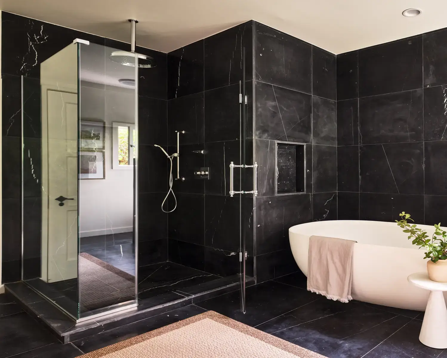A Renovated Spanish Style Home in Hollywood Hills 31 modern-black-bathroom-shower-freestanding-bath-nordroom