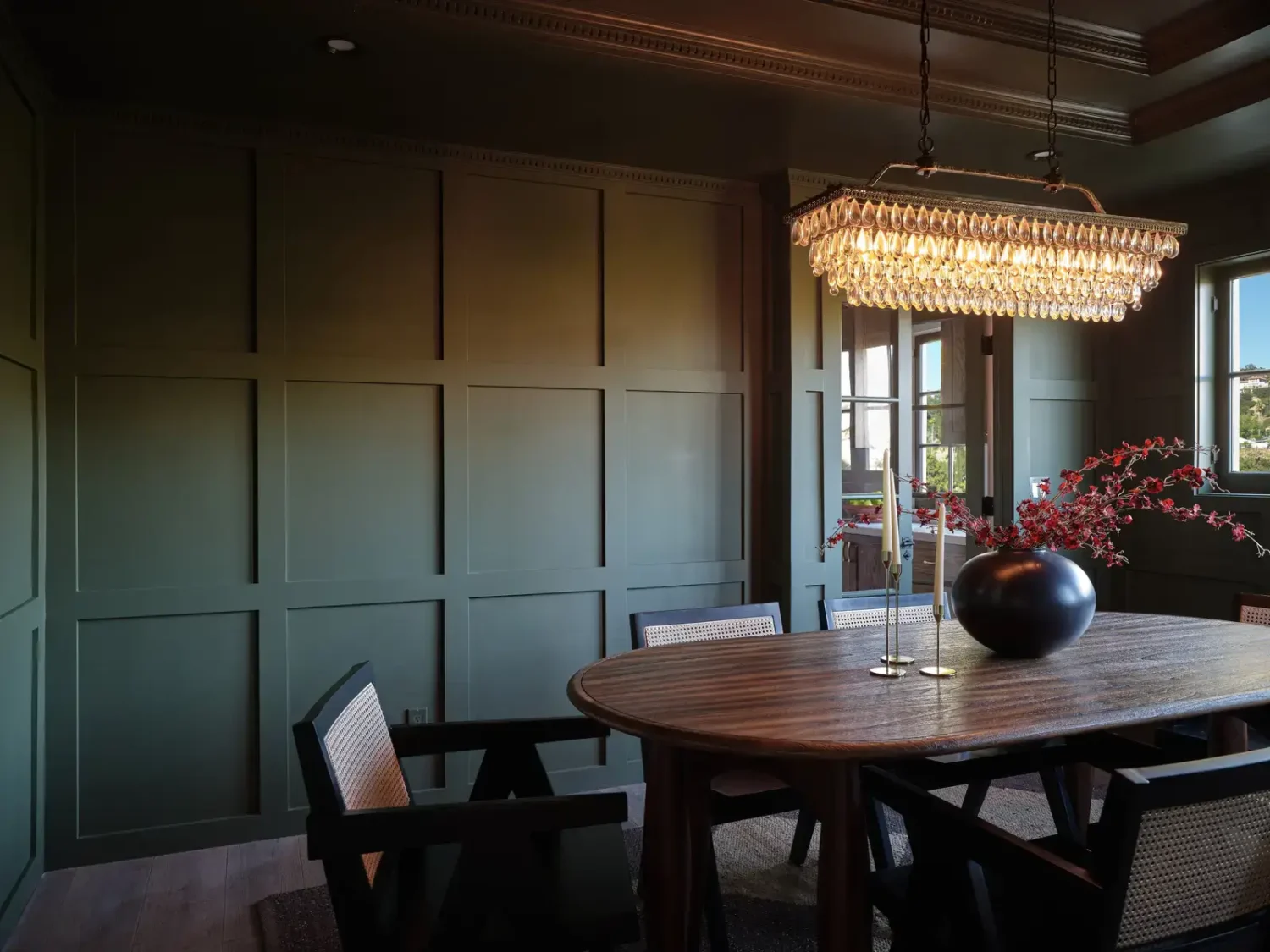 A Renovated Spanish Style Home in Hollywood Hills 19 moody-dark-green-dining-room-nordroom