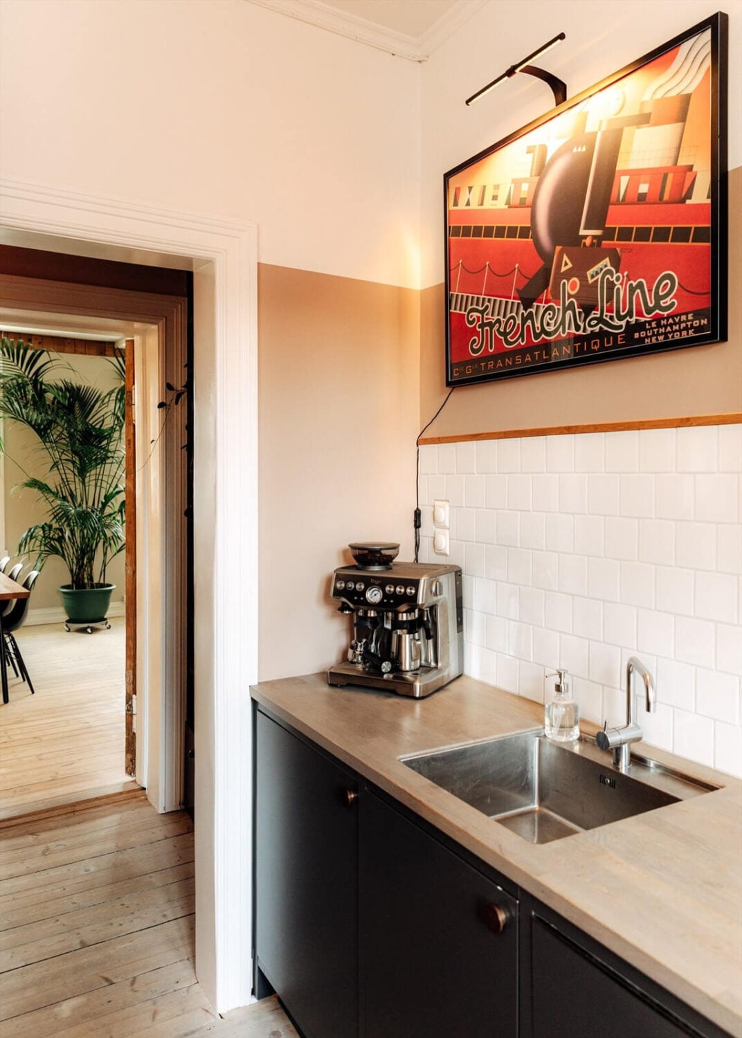 A Charming Norwegian Apartment with Wooden Walls 12 nordic-kitchen-black-cabinets-nordroom