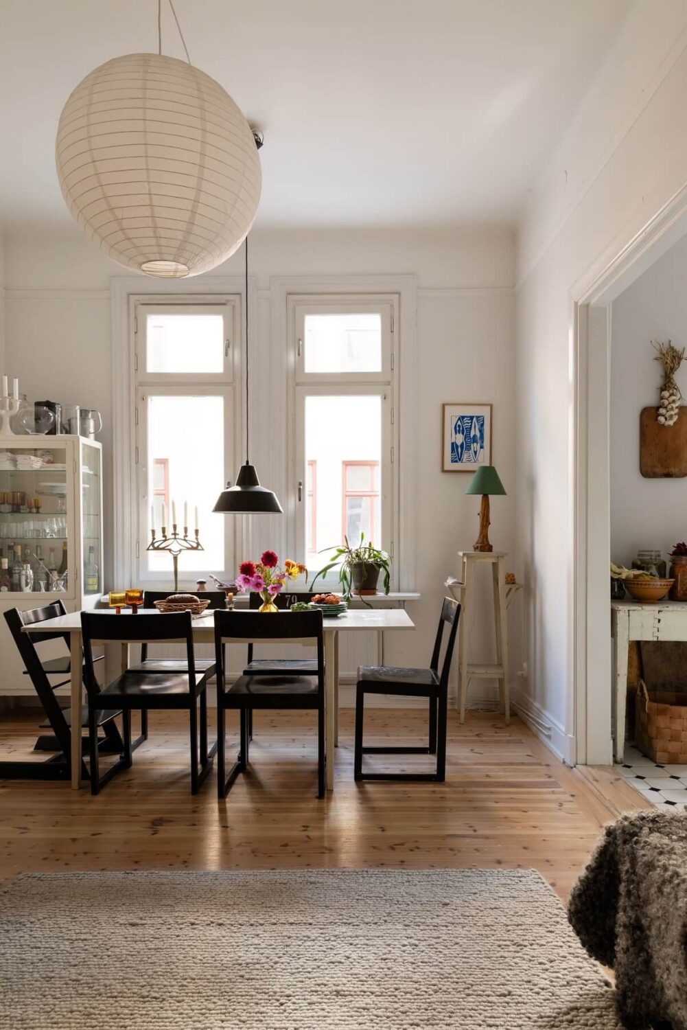 A Bright Scandinavian Apartment with a Light Gray Kitchen 6 open-plan-living-room-dining-table-nordroom