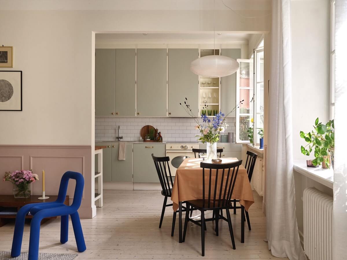 Pastel Colors in a Light Scandinavian Apartment 6 open-plan-living-room-kitchen