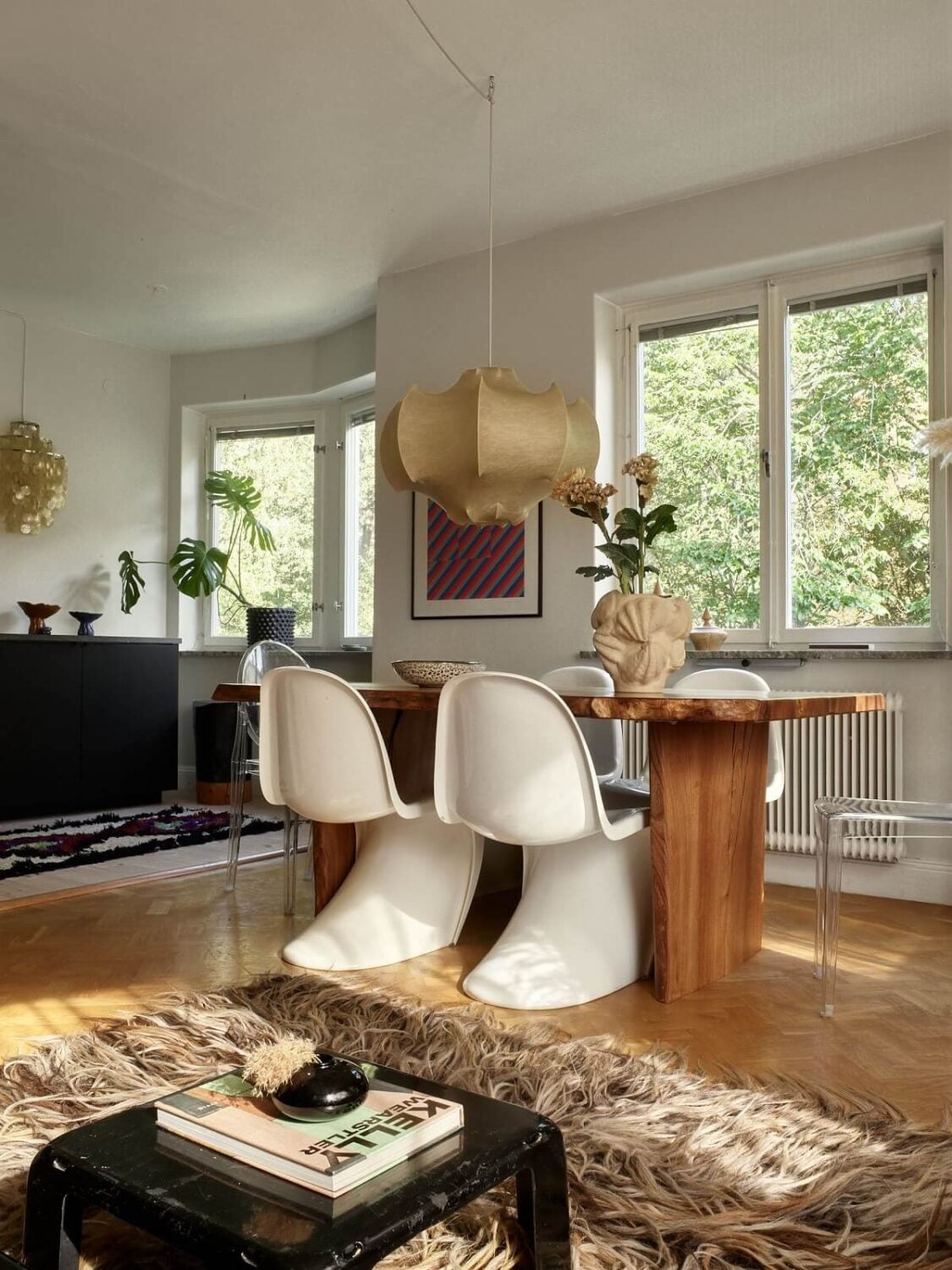 Warm Pink Tones in A Stockholm Apartment 7 open-plan-living-room-wooden-dining-table-nordroom