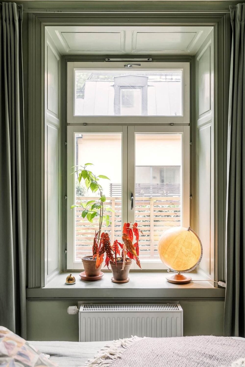 A Vintage Style Apartment in Stockholm 10 pastel-green-wall-color-deep-window-sill-nordroom