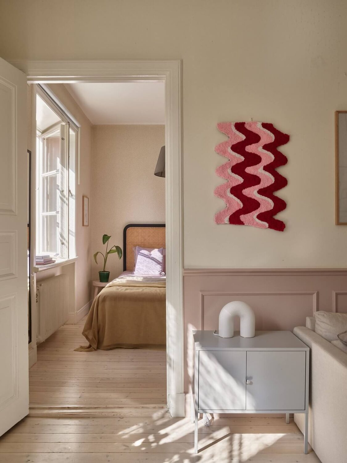 Pastel Colors in a Light Scandinavian Apartment 12 pastel-pink-accents-living-room-nordroom