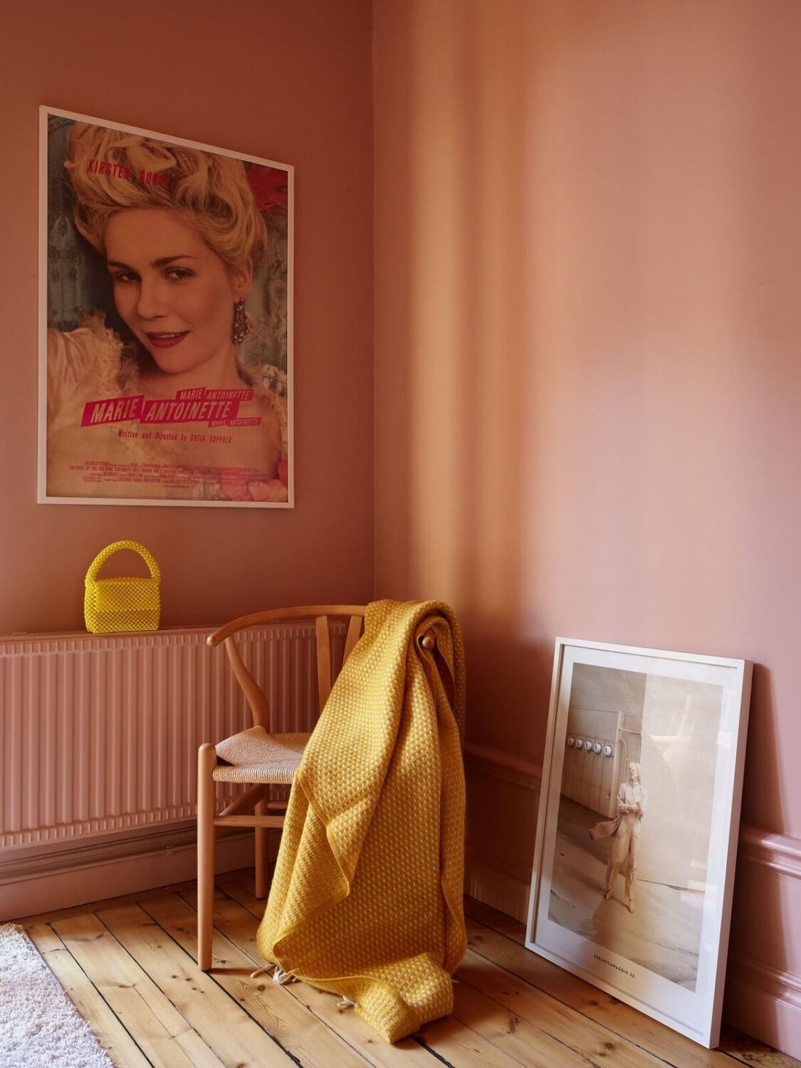 A Small Stockholm Apartment Filled with Color 12 pink-bedroom-accent-marie-antoinette-film-poster-nordroom