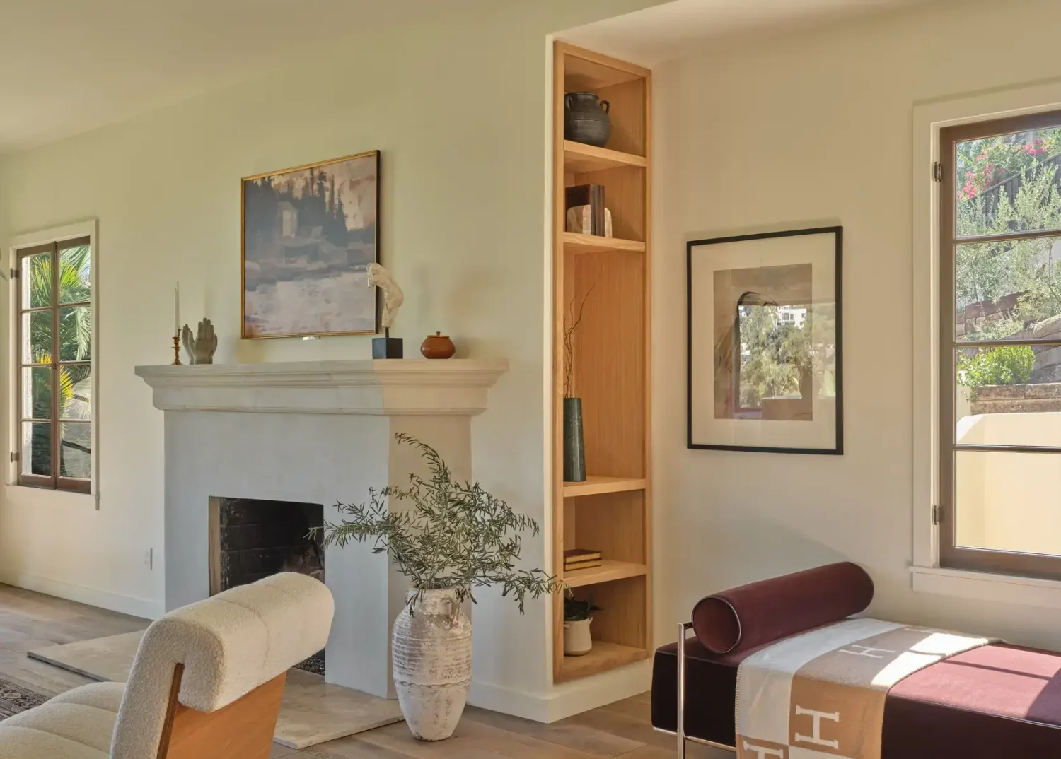 A Renovated Spanish Style Home in Hollywood Hills 5 reading-nook-built-in-shelves-bench-nordroom