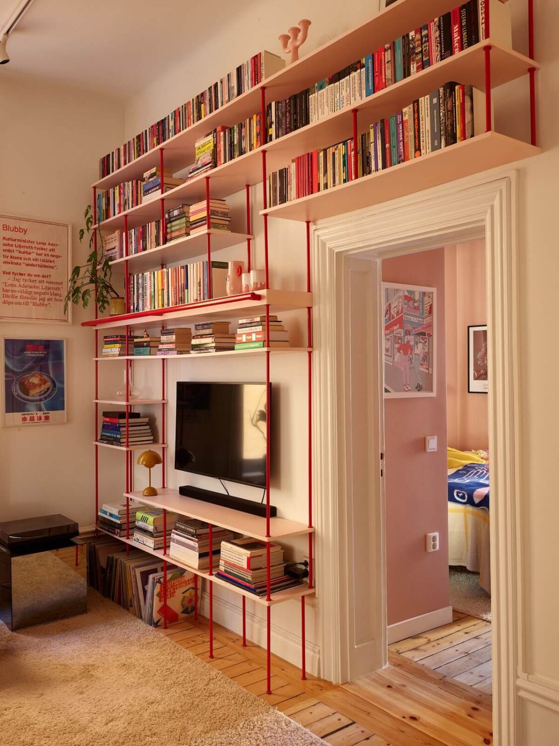 50+ Rooms That Prove ‘The Unexpected Red Theory’ Really Works 41 red-wood-bookshelves-colorful-home-nordroom