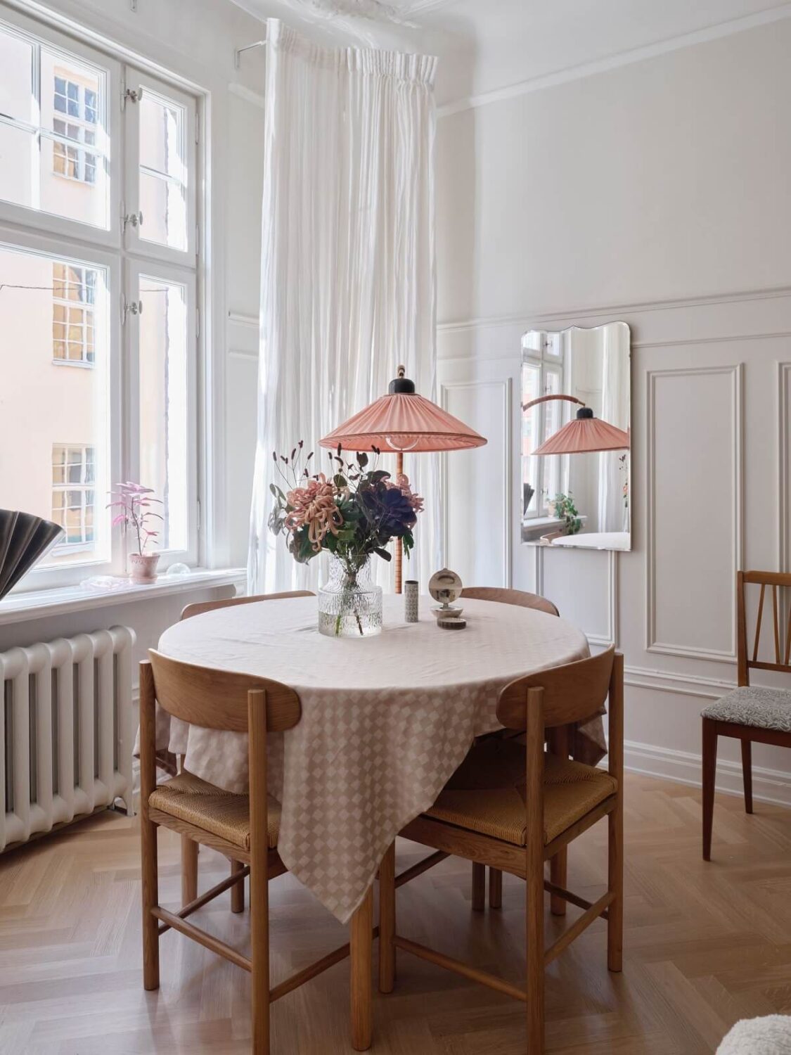 A Light Scandinavian Apartment with Classic Touches 9 round-dining-table