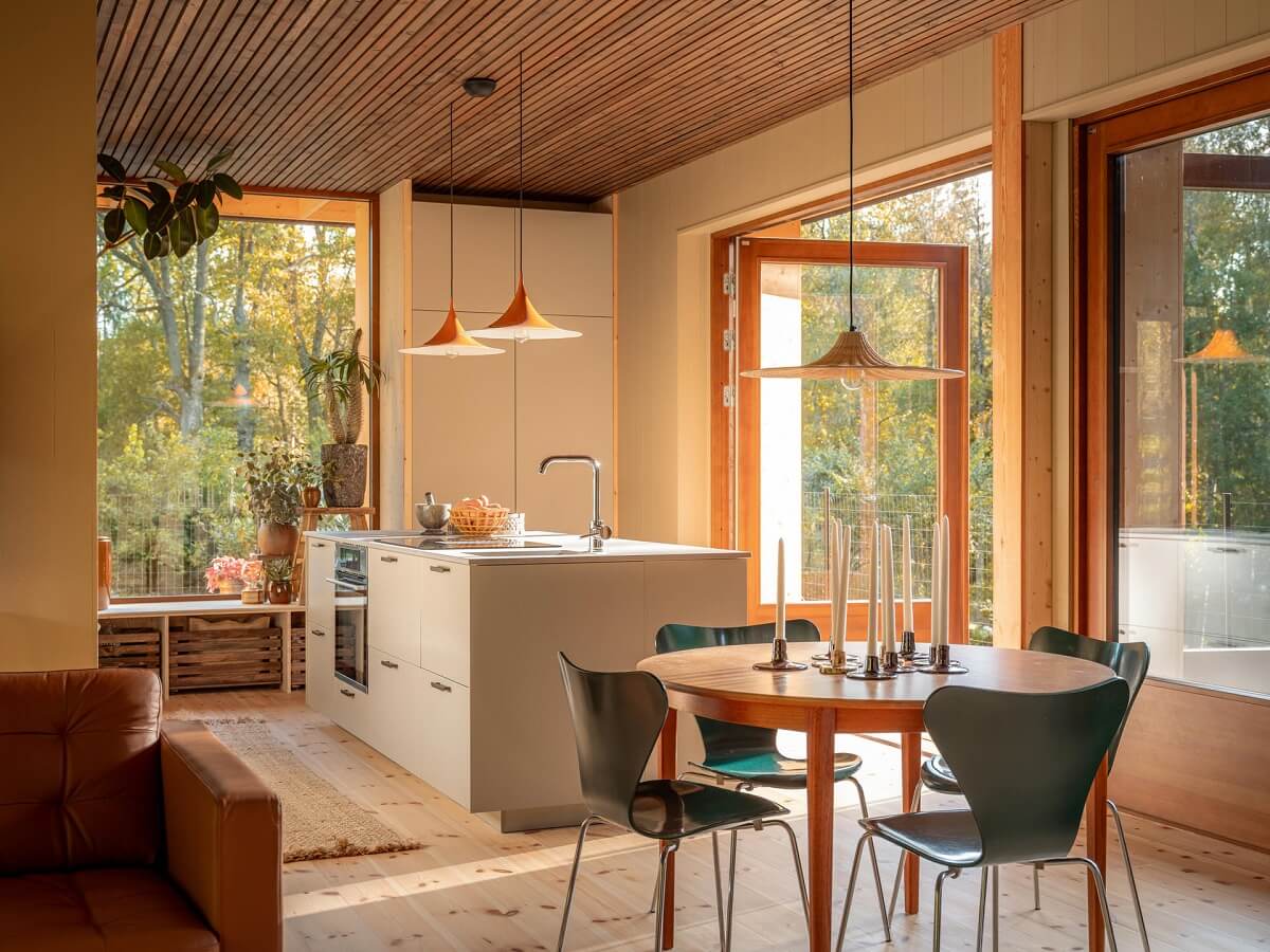An Architectural Wooden Home with Open Spaces 5 round-dining-table-kitchen-nordroom