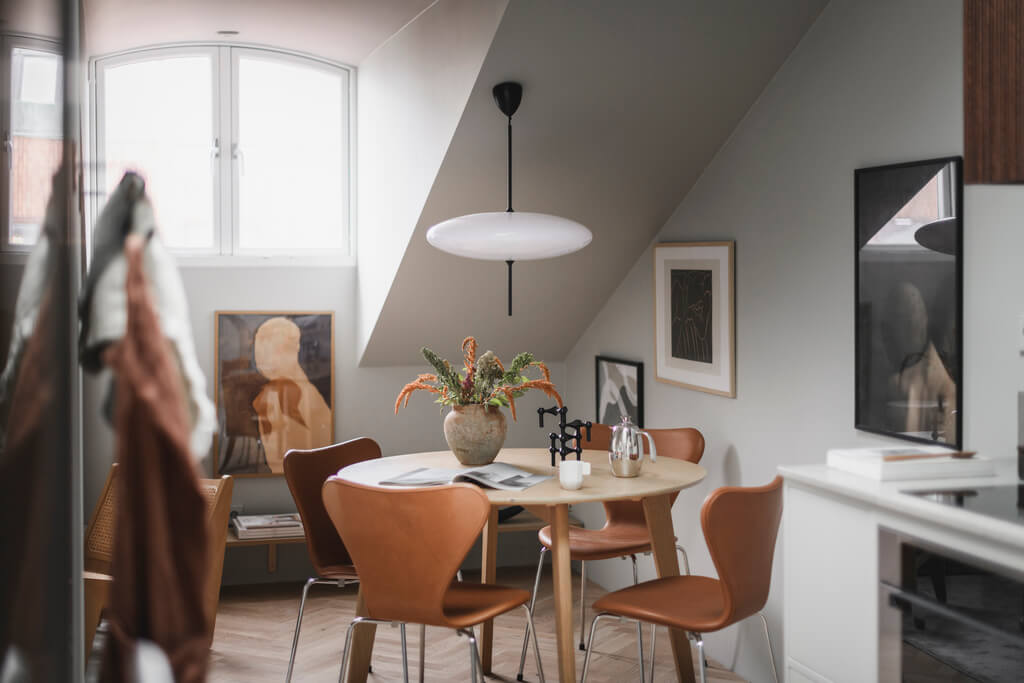 A Stylish Modern Gray Attic Apartment 6 round-dining-table-kitchen-nordroom