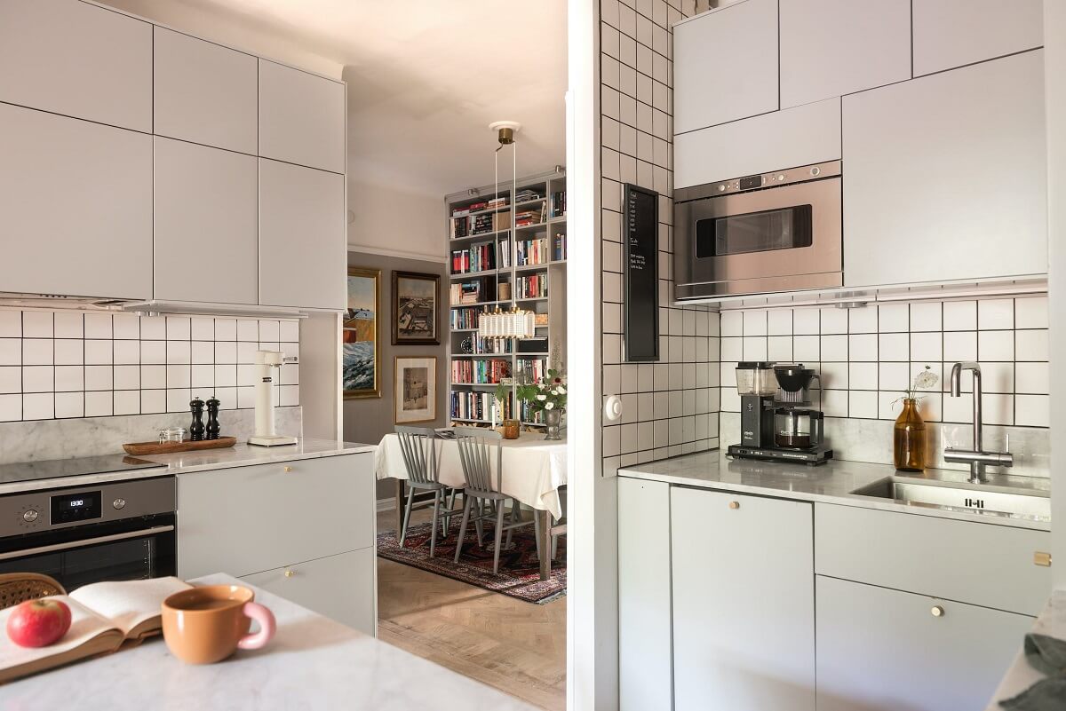 A Charming Open Plan Swedish Apartment 8 scandinavian-kitchen-dining-room-nordroom
