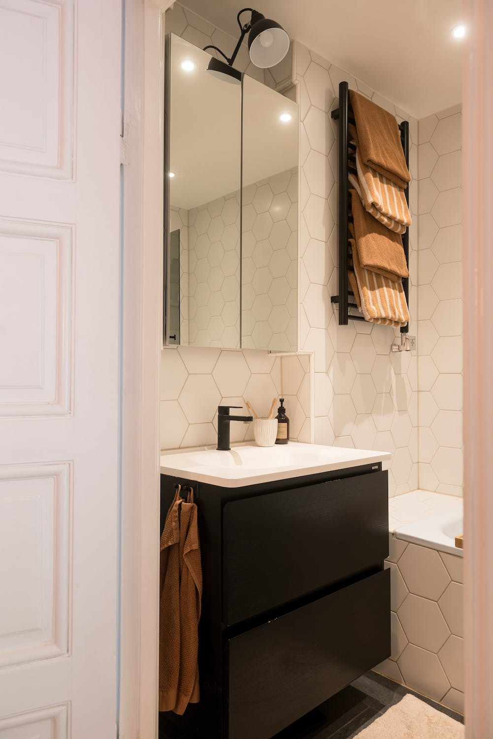 A Charming Open Plan Swedish Apartment 17 small-bathroom-mirror-cabient-nordroom