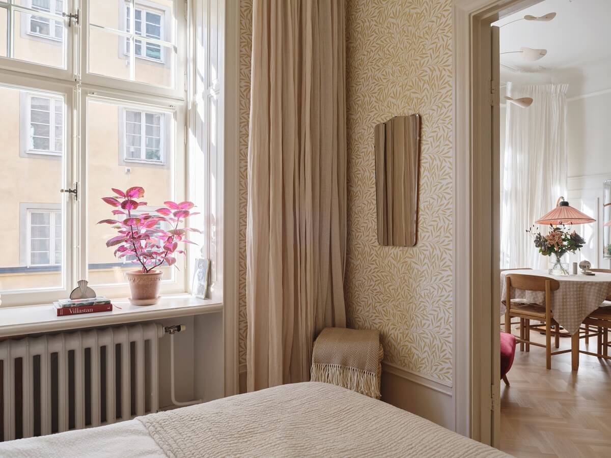 A Light Scandinavian Apartment with Classic Touches 14 small-bedroom-wallpaper-nordroom