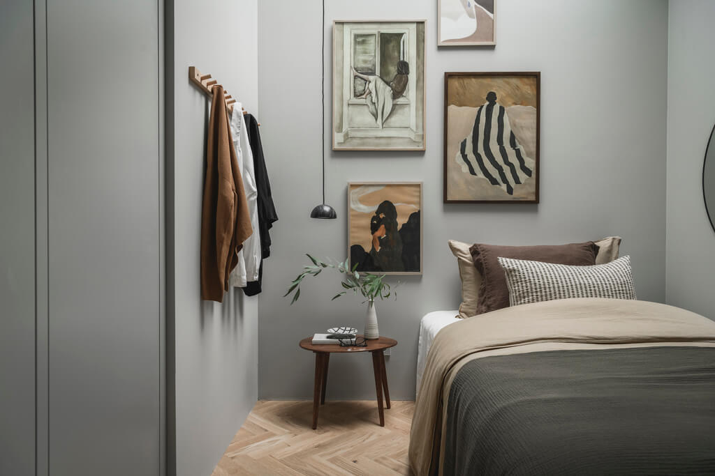 A Stylish Modern Gray Attic Apartment 18 small-light-gray-bedroom-gallery-wall-nordroom